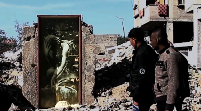 World Famous Graffiti Artist “Banksy” Sneaks Into Palestine!