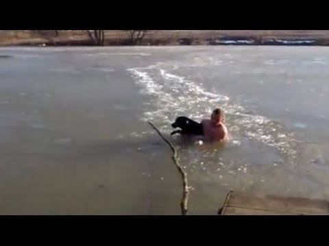 Guy breaks through frozen river to save his dog