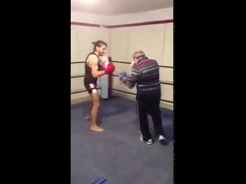 old boxing trainer schools student